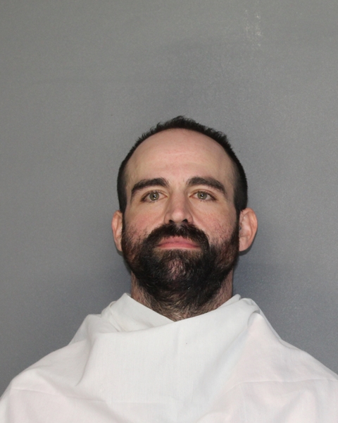 Mugshot of MATTHEW CAREY WOODS