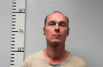 Mugshot of Justin Wayne Breckenridge