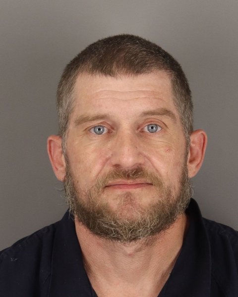 Mugshot of JUSTIN VIGEON