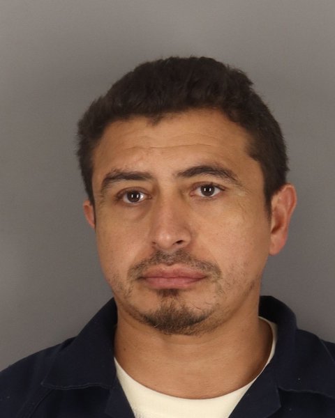 Mugshot of JUNIOR VIDES-ROMERO