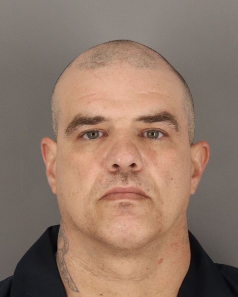Mugshot of JUSTIN MOORE