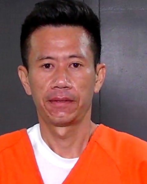 Mugshot of LE NHAT