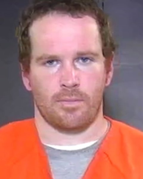 Mugshot of JUSTIN EVANS