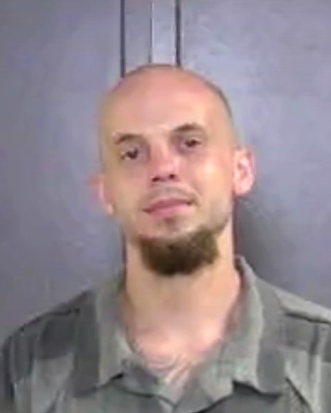 Mugshot of REX COMER