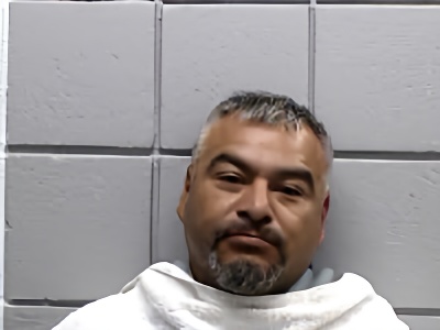 Mugshot of JOHN ANGEL AGUINAGA