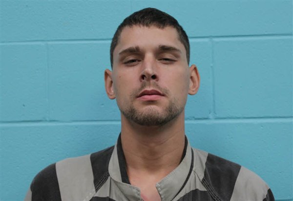 Mugshot of DUSTIN JOSEPH GREIG