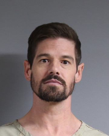 Mugshot of JUSTIN ALAN ERNST