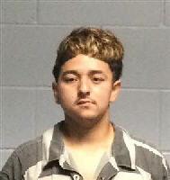 Mugshot of PAUBLO ADONAY FLORES