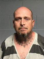 Mugshot of MICHAEL LLOMA HUGHES