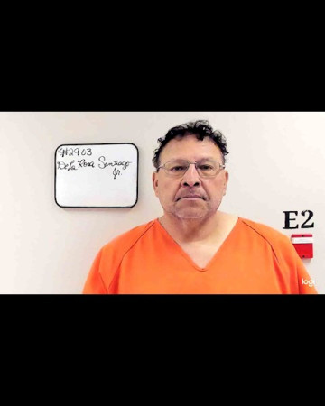 Mugshot of SANTIAGO JR DE LA ROSA