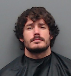 Mugshot of AUSTIN TAYLOR METCALF