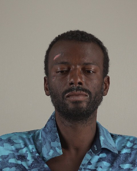 Mugshot of JUSTIN BENN