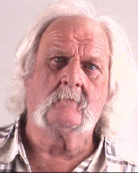 Mugshot of EARL COMER