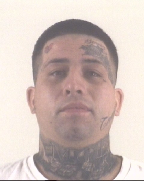Mugshot of MOSES OLGUIN