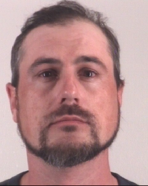 Mugshot of JOSHUA HUBER