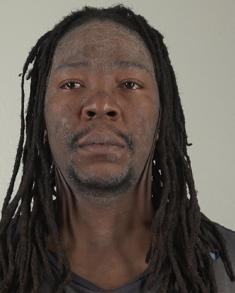 Mugshot of JONATHAN MBAYI