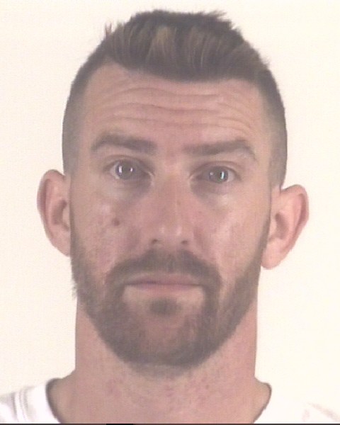 Mugshot of JUSTIN HARMON