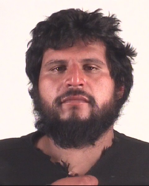 Mugshot of CHRLES AJUCHAN