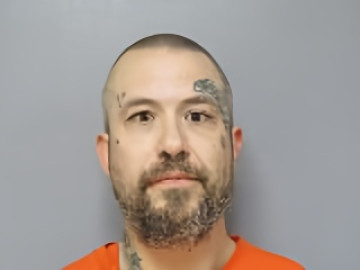 Mugshot of Jeremy Lee Huisenga