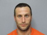 Mugshot of Justin Lee Pavek