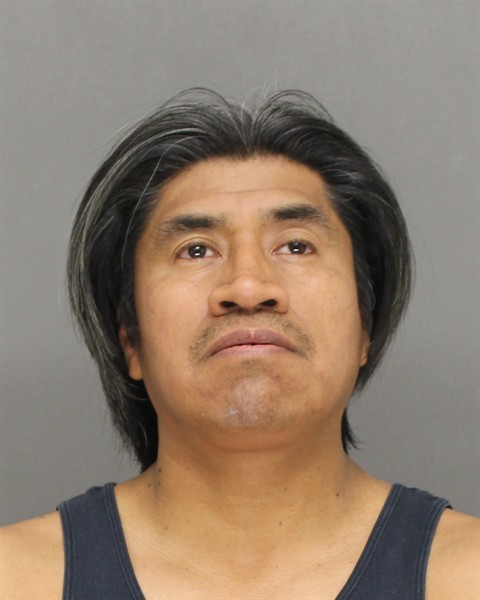 Mugshot of INOCENCIO NMI SANTIAGO-MARTINEZ