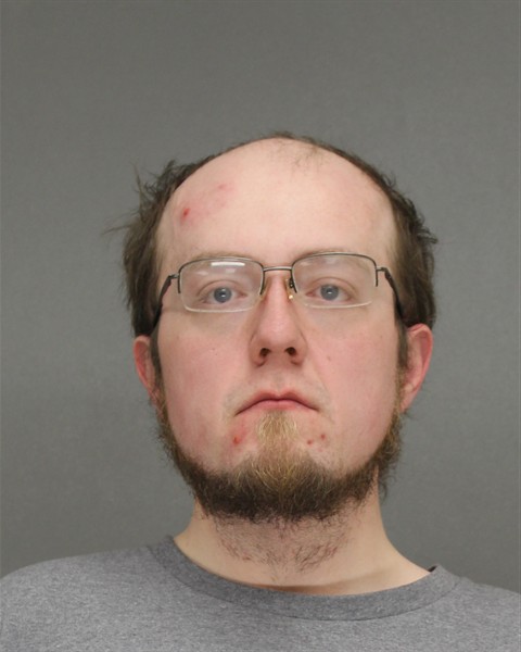 Mugshot of AUSTIN WILLIAM COUILLARD