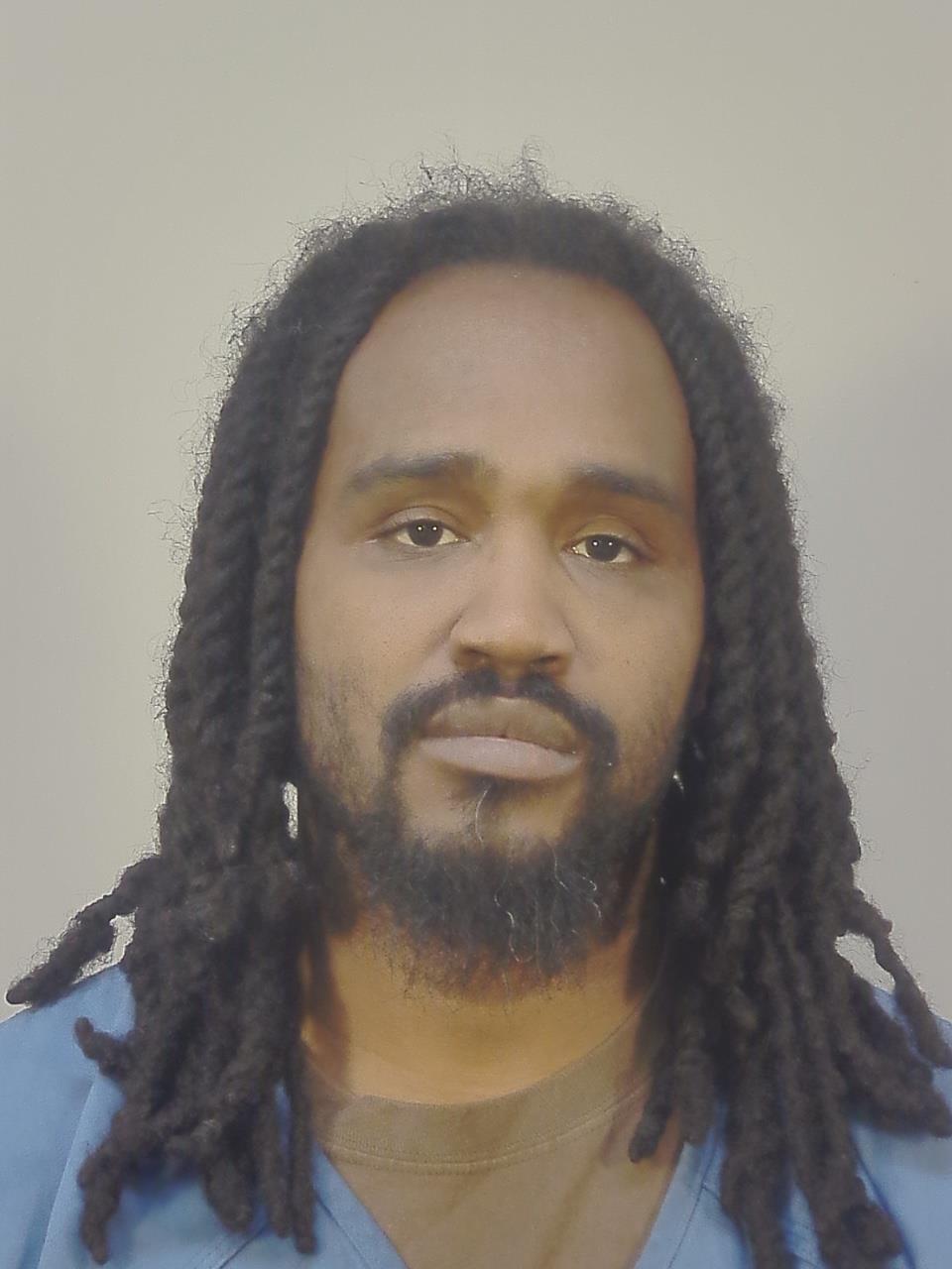 Mugshot of JOHN HENRY EVANS