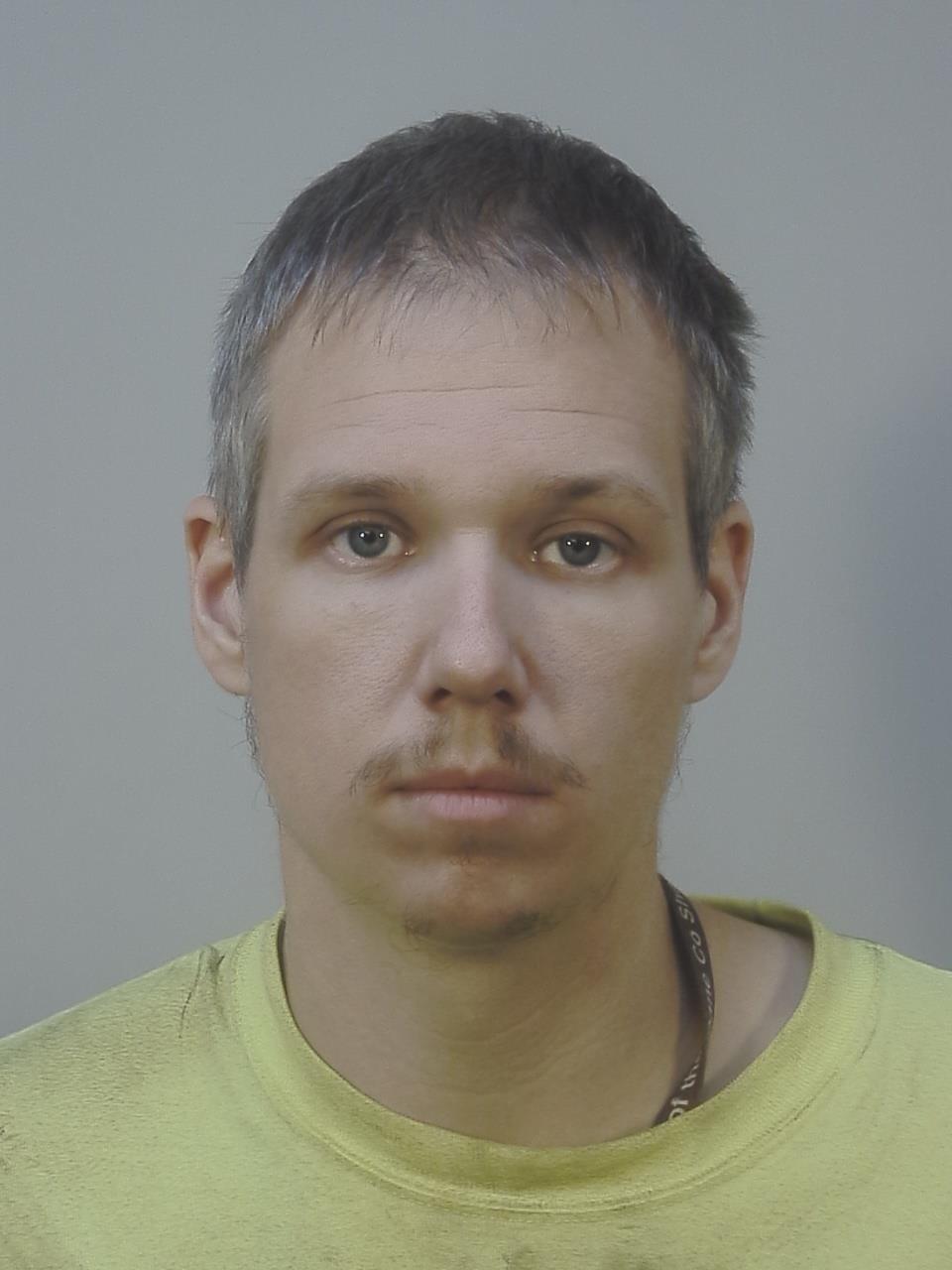 Mugshot of RYAN TODD HUSKEY