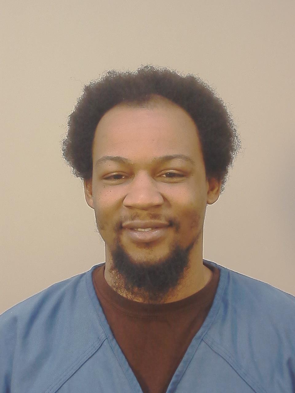 Mugshot of JUSTIN DENZEL REASBY