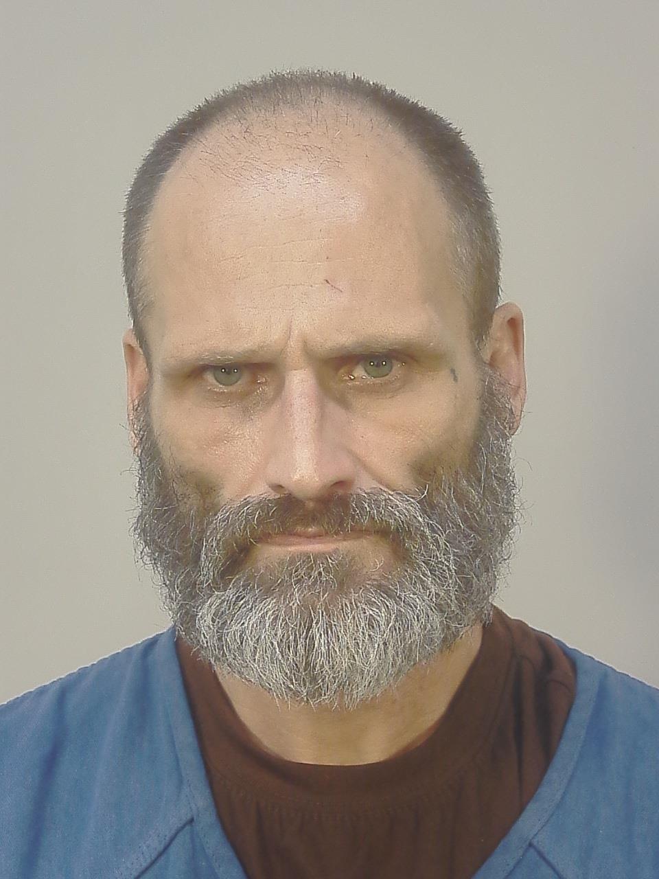 Mugshot of EARL VERNON HOLSTEN