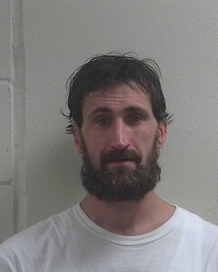 Mugshot of JUSTIN T KNUTSON