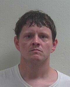 Mugshot of TIMOTHY S TUURA