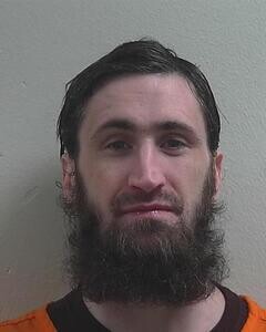 Mugshot of JUSTIN T KNUTSON