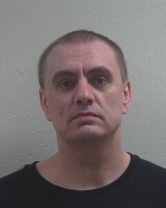 Mugshot of RYAN D POULIOT