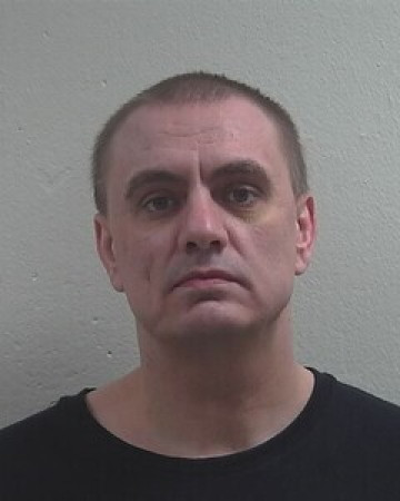 Mugshot of RYAN D POULIOT