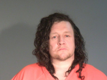 Mugshot of SCOTT D SILVA