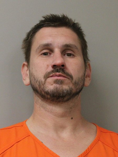 Mugshot of TRAVIS W PARTON