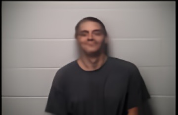 Mugshot of ERIC J WOLLER