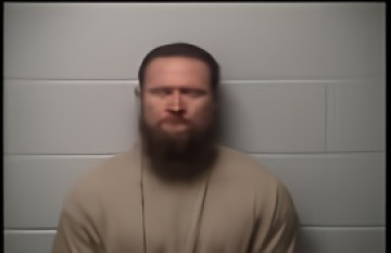 Mugshot of DUSTIN C SHAW