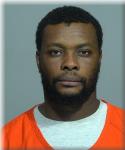 Mugshot of Papy Iyangi