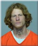 Mugshot of Thomas James