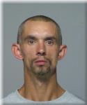 Mugshot of George Budda