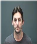 Mugshot of Travis Miller