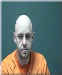 Mugshot of Amos Ames