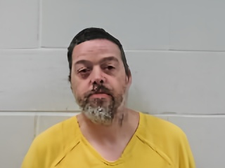 Mugshot of Frank Earl Whitcomb