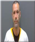 Mugshot of Adric Centell-dunk