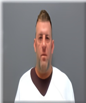 Mugshot of Isaac Dupuis