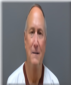 Mugshot of John Furdek