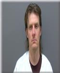 Mugshot of Douglas Della