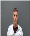 Mugshot of Justin Leach